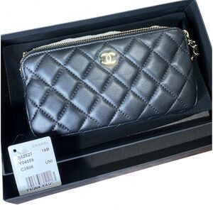 CHANEL Lambskin Quilted Small Clutch With Chain in Black A82527